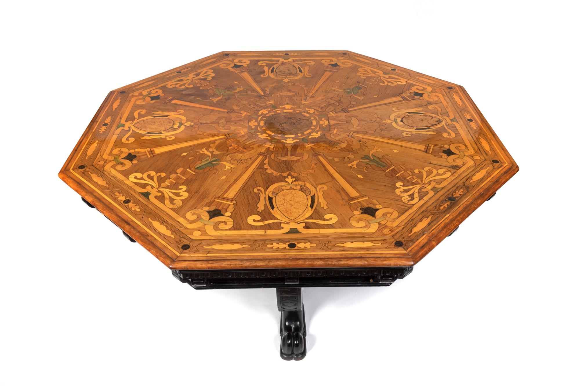 An Italian Marquetry Inlaid and Ebonized Octagonal Center Table — 19TH CENTURY