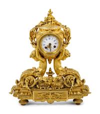 A Louis XV Style Gilt Bronze Mantel Clock