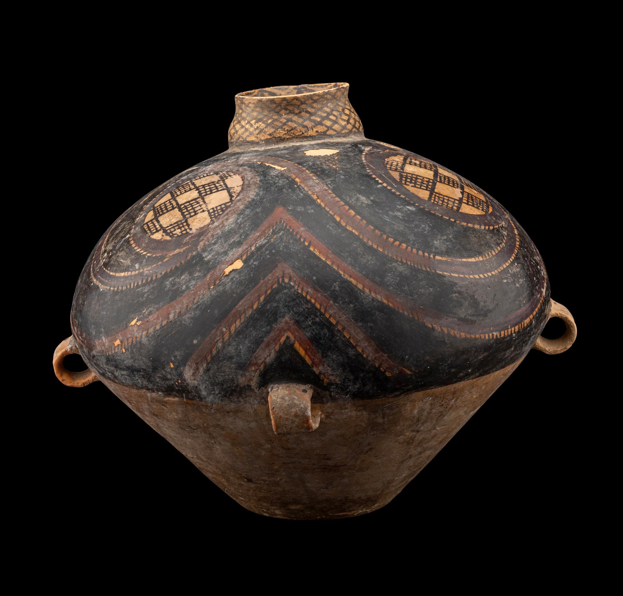 A Chinese Painted Pottery Handled Jar