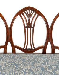 A George III Mahogany Triple-Back Settee