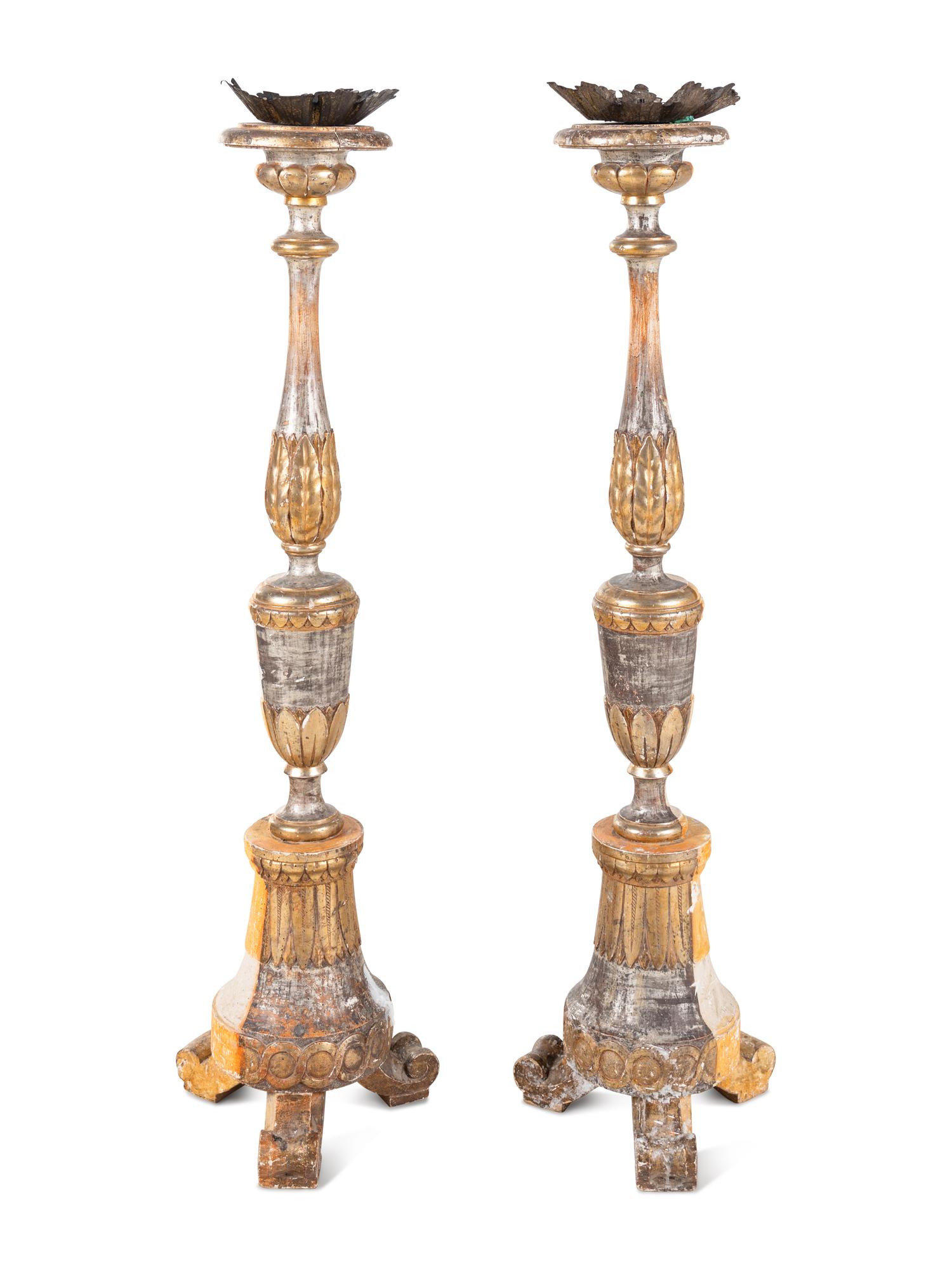 A Pair of Italian Painted and Parcel-Gilt Pricket Sticks