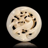 A Carved White Jade Pendant
