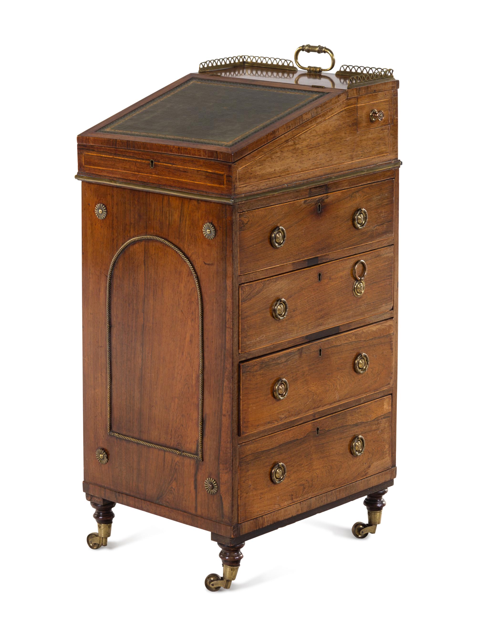 A Regency Brass Mounted and Leather-Inset Mahogany Davenport Desk