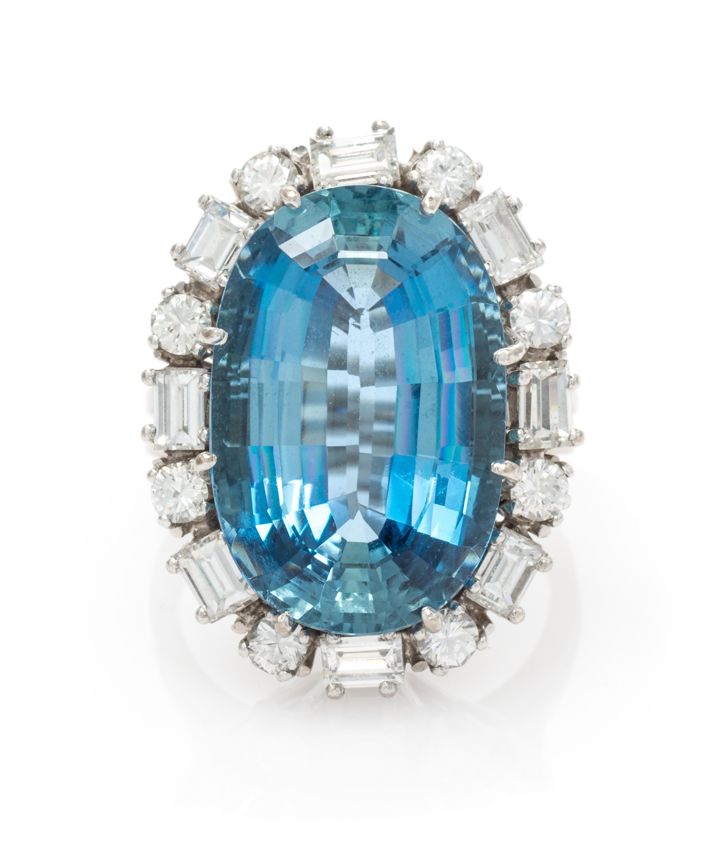 An 18 Karat White Gold, Aquamarine and Diamond Ring, 7.00 dwts.