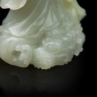 A Chinese Jade Figural Group of Guanyin and Boy 青白玉雕送子觀音