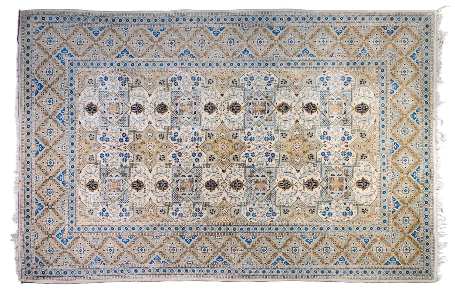 A Kashan Wool Rug 10 feet 11 inches x 7 feet 9 inches.