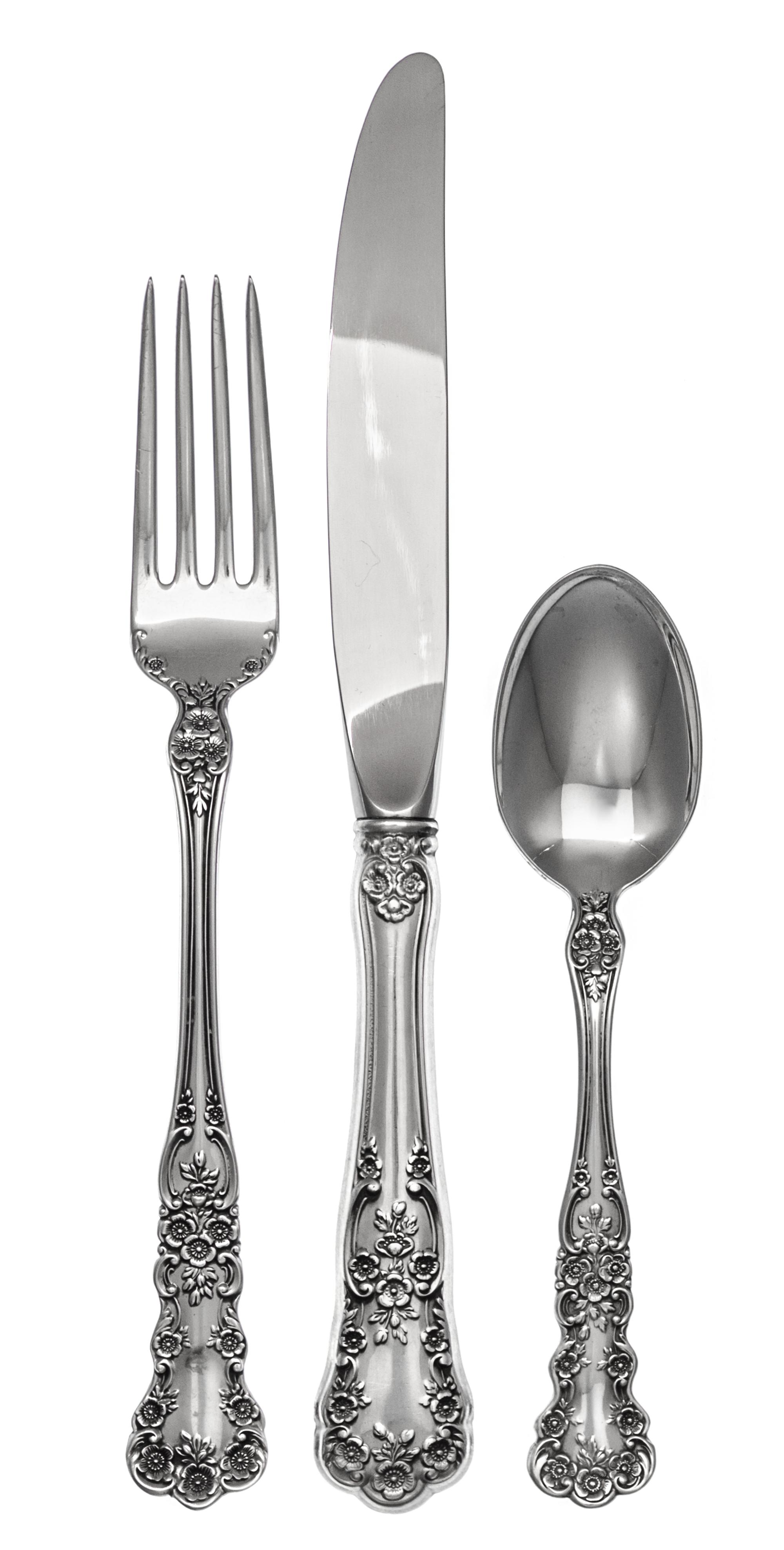 An American Silver Flatware Service, Gorham Mfg. Co., Providence, RI, Blossom pattern, comprising: 12 dinner knives 12 dinner forks 12