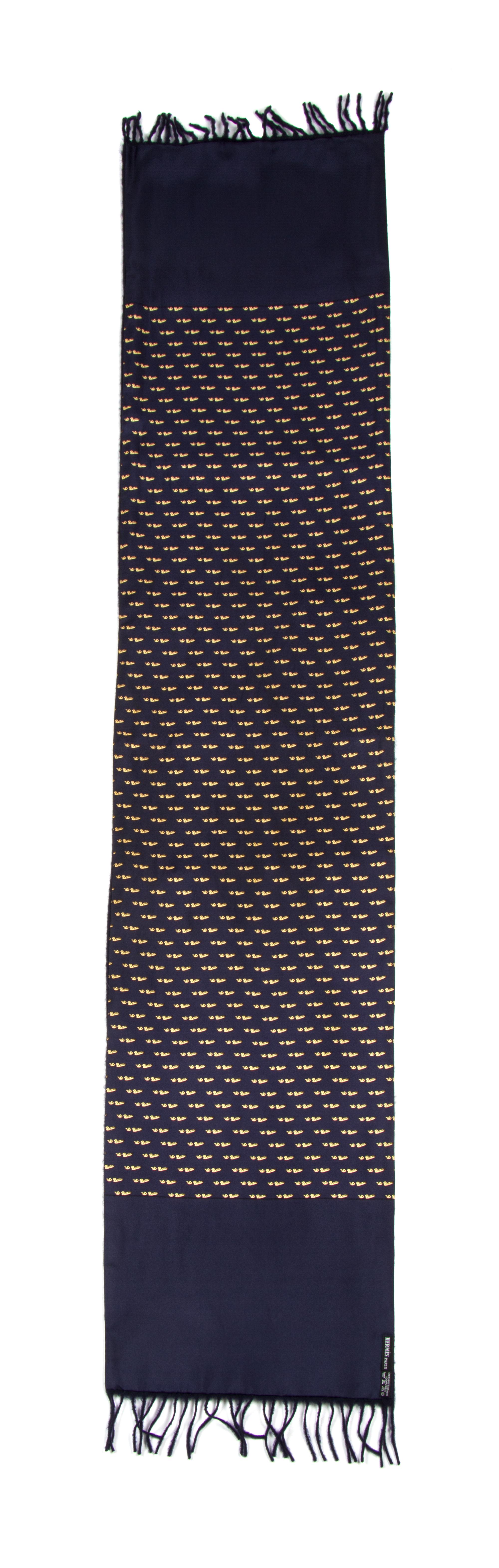 An Hermes Navy Cashmere and Silk Muffler, 54" x 11".