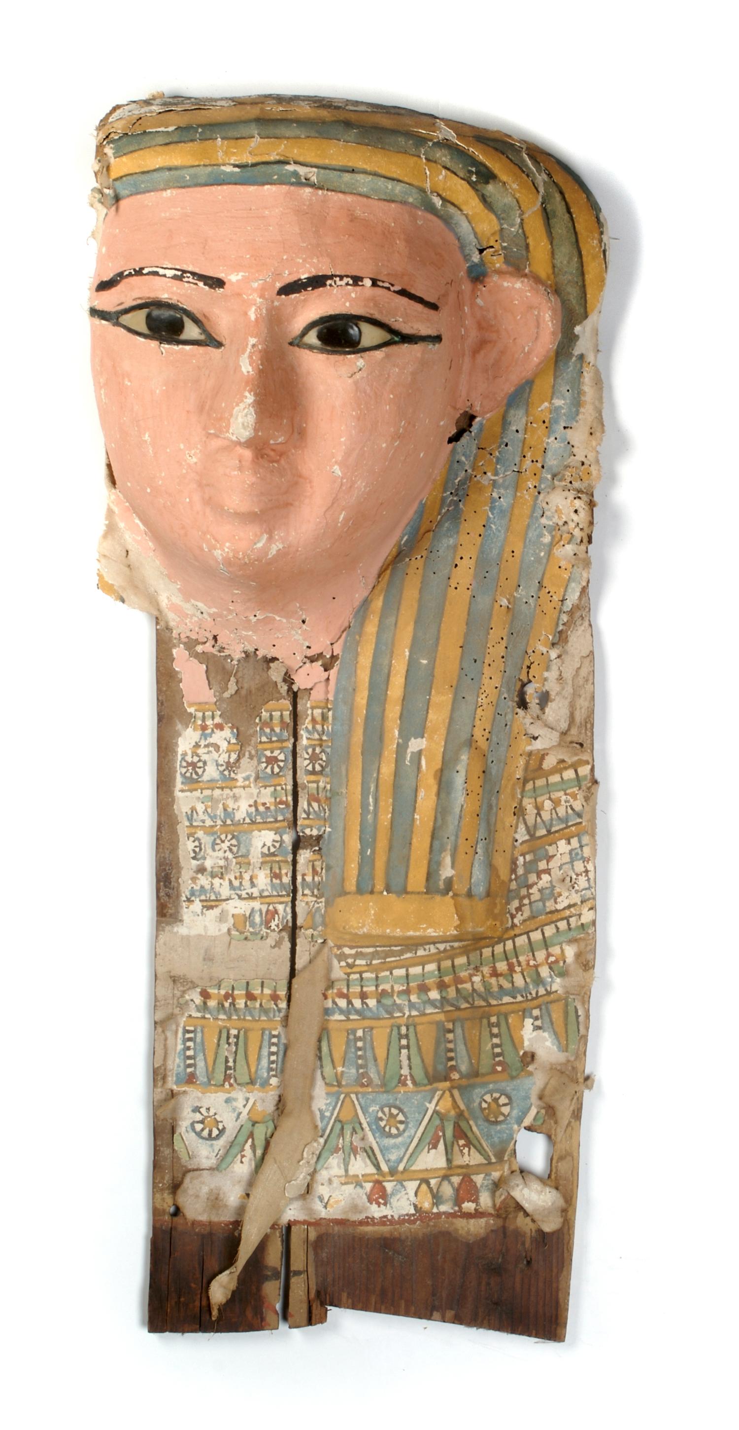 An Egyptian Painted Wood Sarcophagus Mask, Height 30 inches.