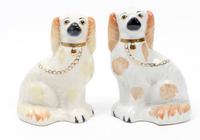 A Pair of Staffordshire Spaniels Height 7 3/4 inches. — 19TH/20TH CENTURY