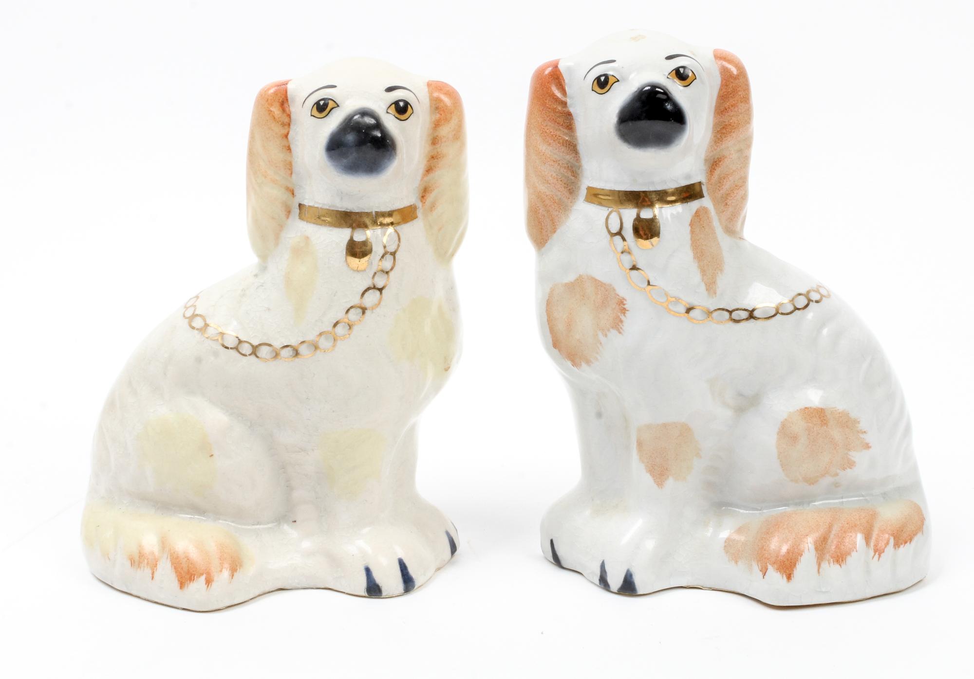 A Pair of Staffordshire Spaniels Height 7 3/4 inches. — 19TH/20TH CENTURY