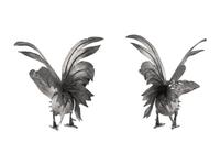 A Pair of Continental Silvered-Metal Roosters