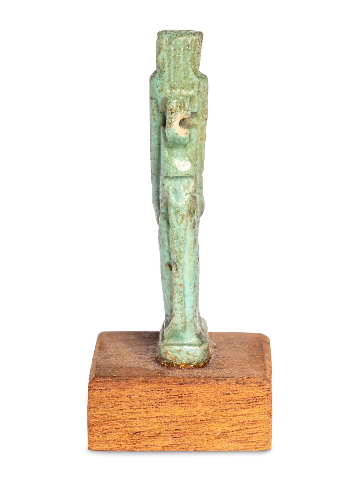 An Egyptian Faience Baboon