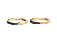 PAIR OF YELLOW GOLD, DIAMOND AND ONYX BANGLE BRACELETS
