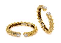 A Pair of 18 Karat Yellow Gold, Platinum and Diamond Bangle Bracelets, David Webb, 26.20 dwts.