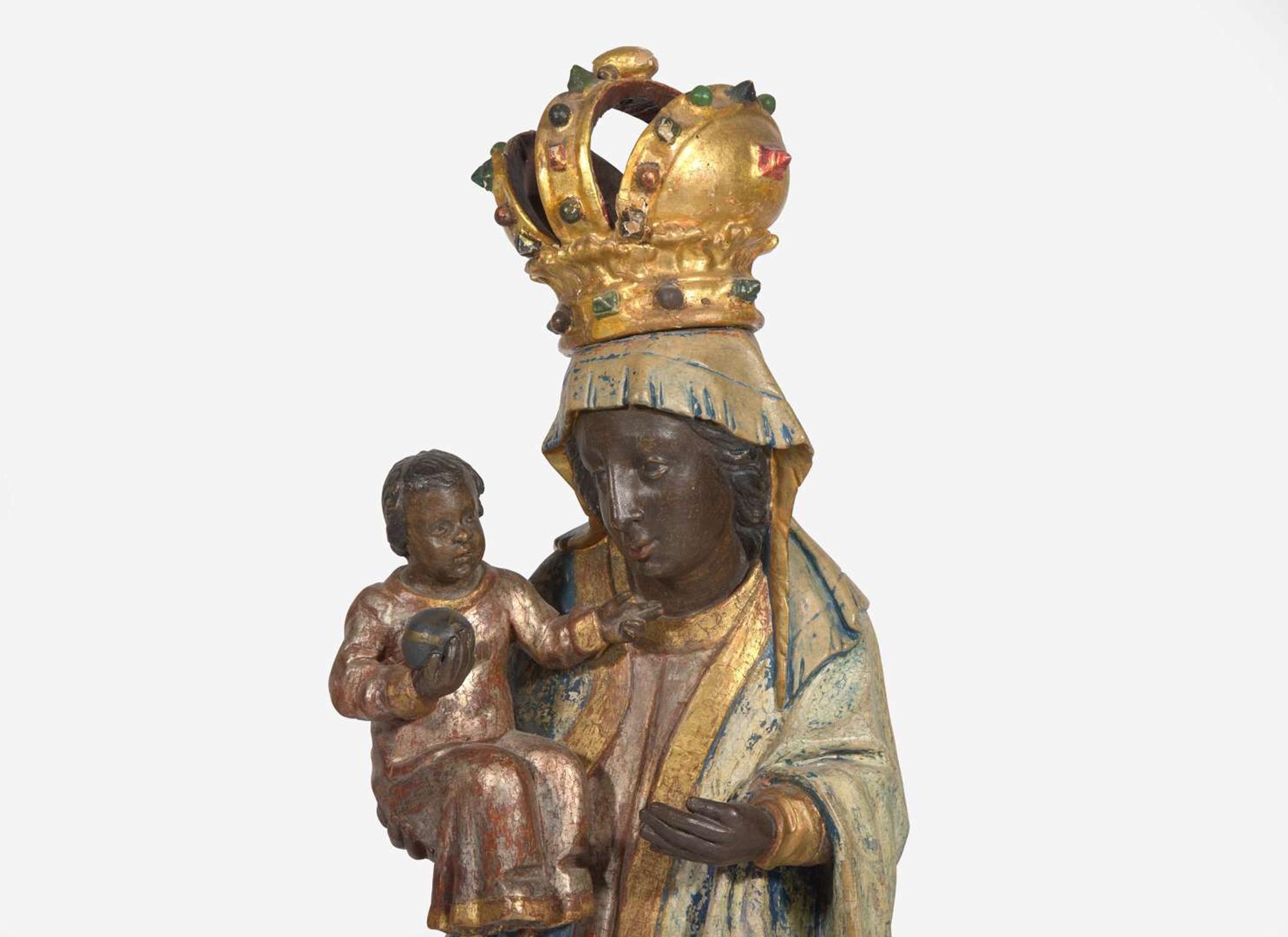 A group of three carved and painted Santos figures, 19th / 20th century