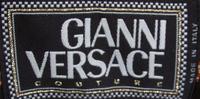 A Gianni Versace Animal Print Ensemble, Jacket and vest size 4, leggings size 42.