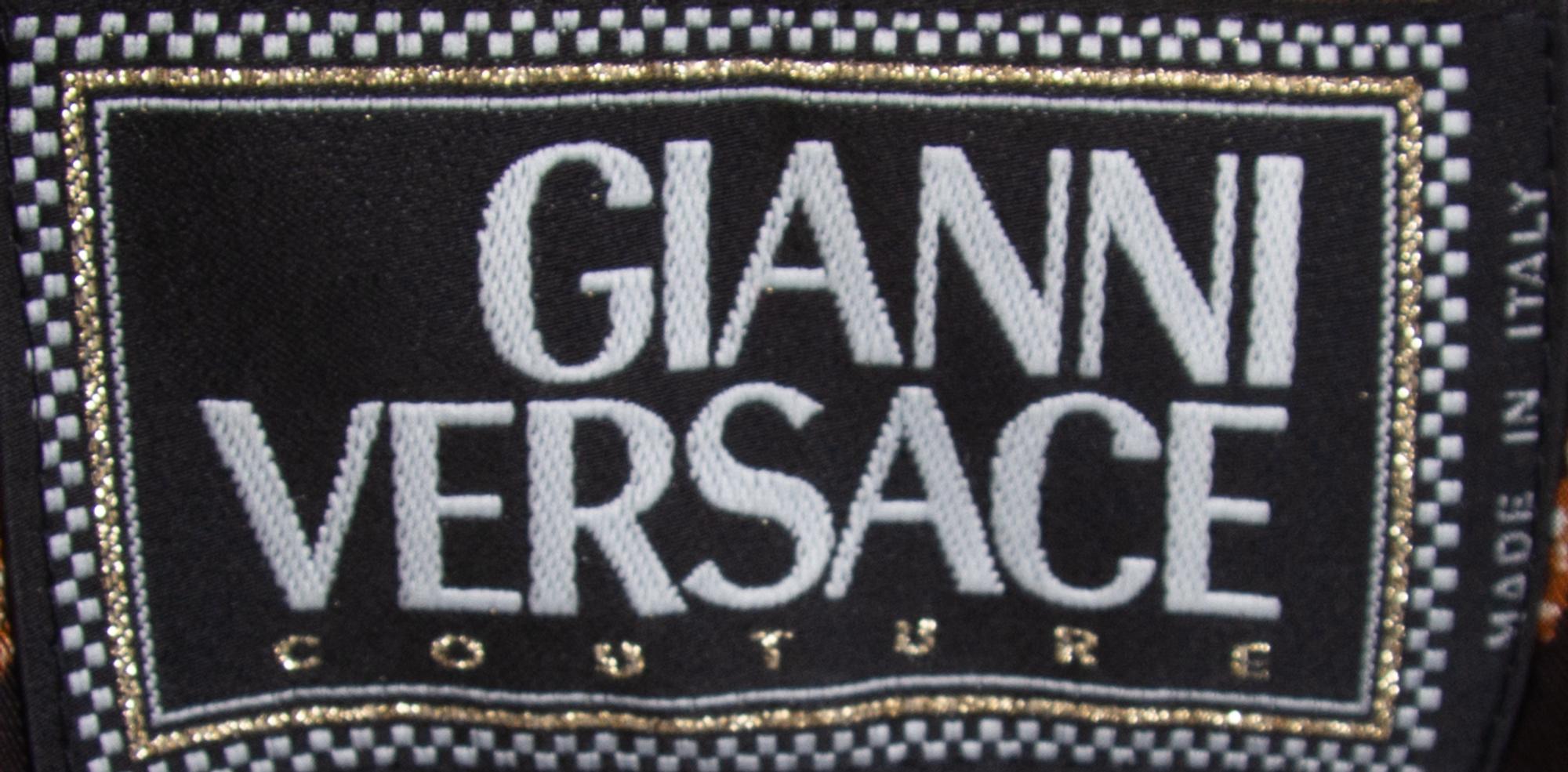 A Gianni Versace Animal Print Ensemble, Jacket and vest size 4, leggings size 42.