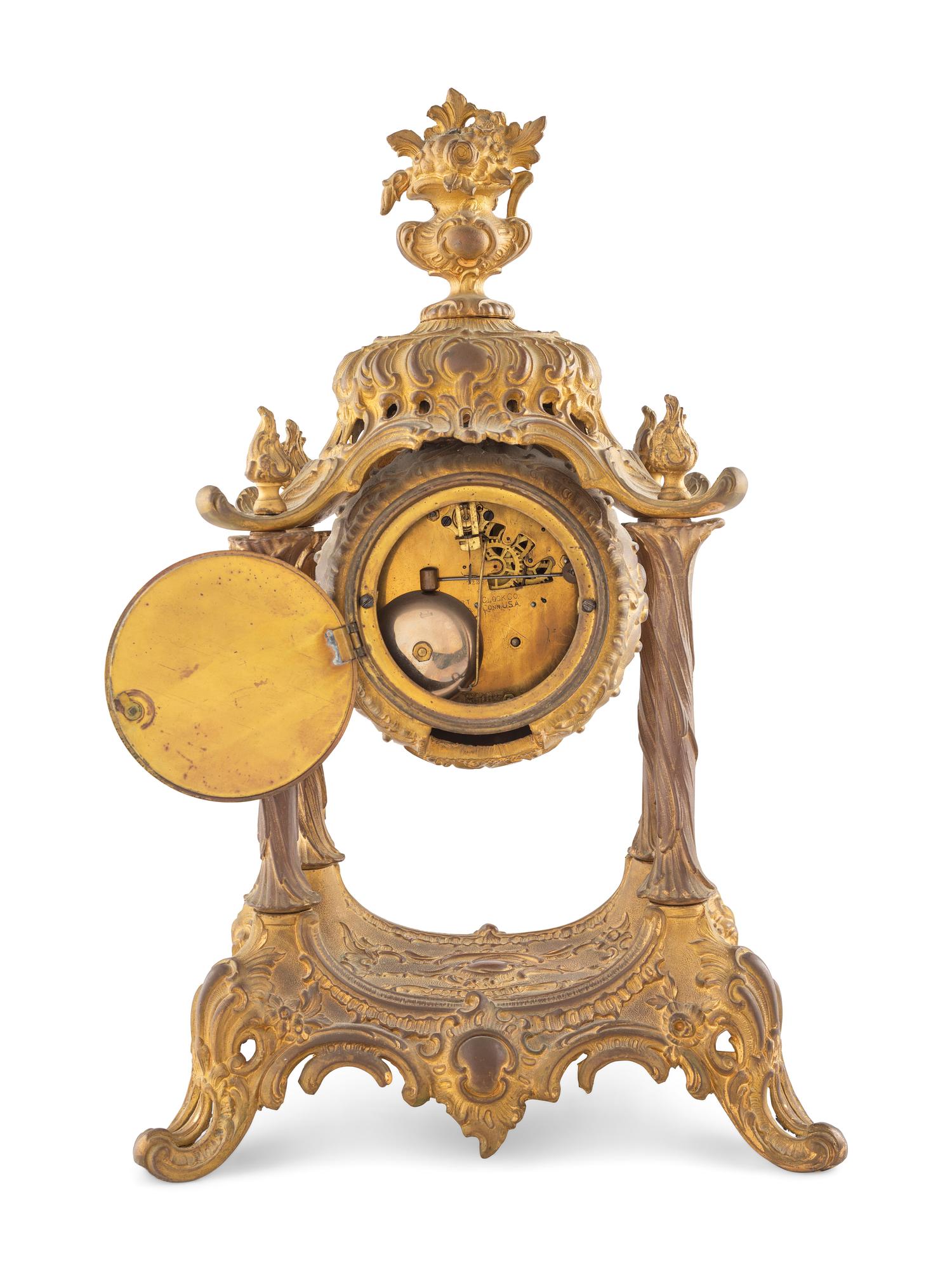 A Louis XV Style Gilt Metal Mantel Clock