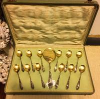 A German Silver Ice Cream Service, Koch & Bergfeld, Bremen, comprising a serving spoon and 12 ice cream spoons, together with a fitted
