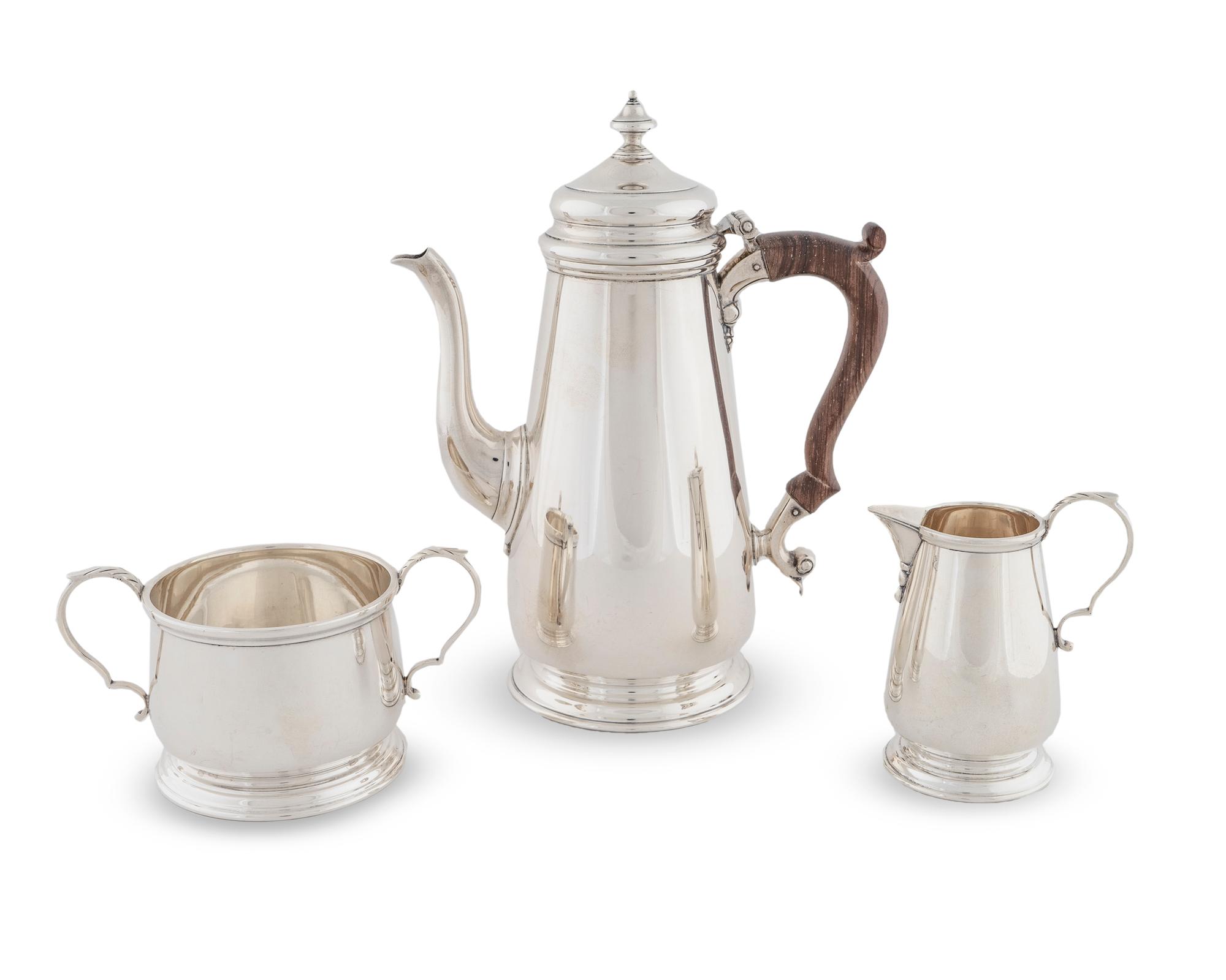 An American Silver Three-Piece Coffee Set — 20TH CENTURY