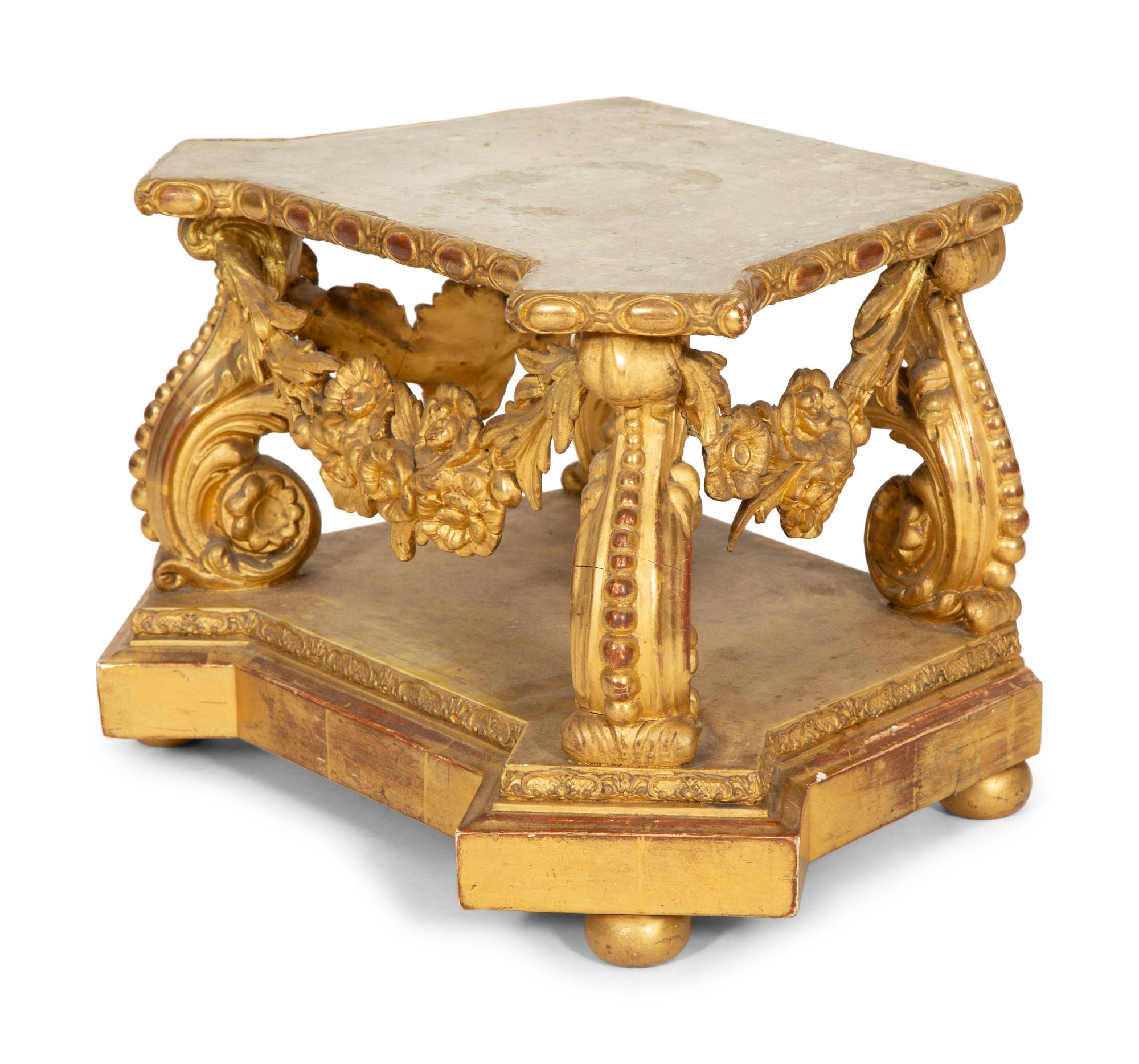 A Georgian Carved, Painted and Parcel Gilt Shaped Pedestal Base