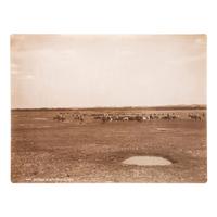 HUFFMAN, Laton Alton (1854-1931). Outdoor portrait of a cowboy on horseback. Miles, MT: Huffman, [ca 1880s].