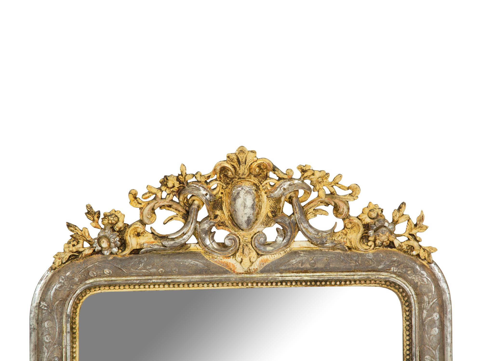 A Napoleon III Silvered and Gilt Wood Mirror