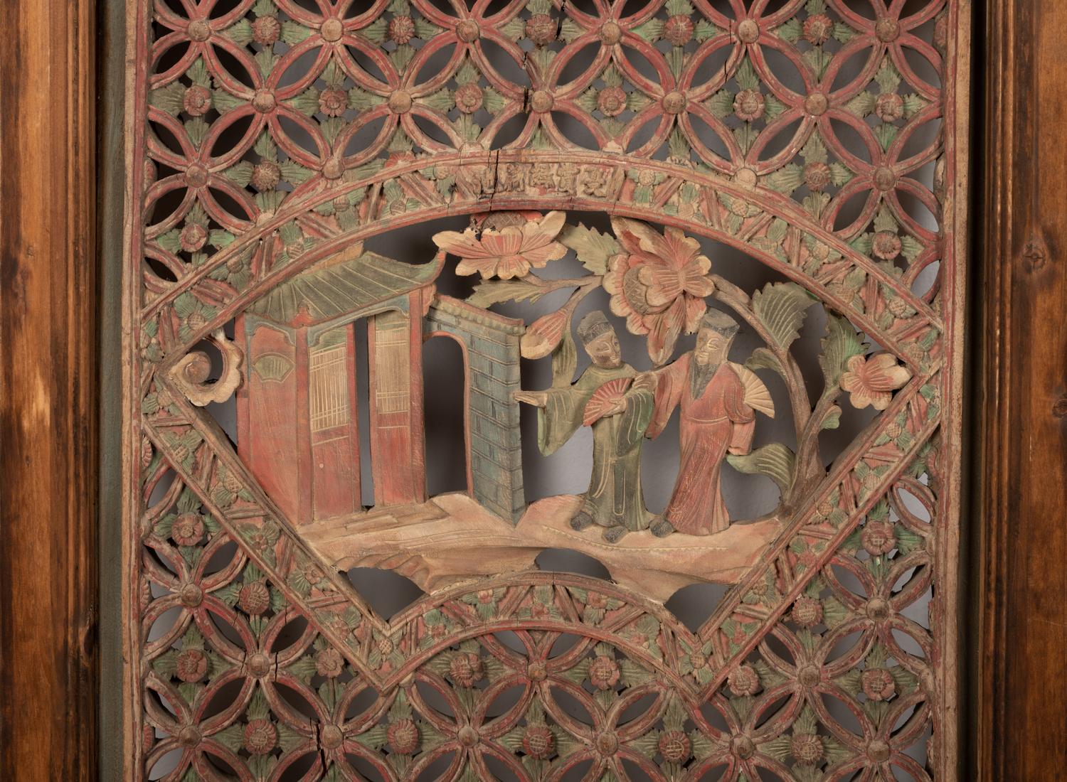 A Group of Four Chinese Pierce-Carved and Polychrome Decorated Window Panels