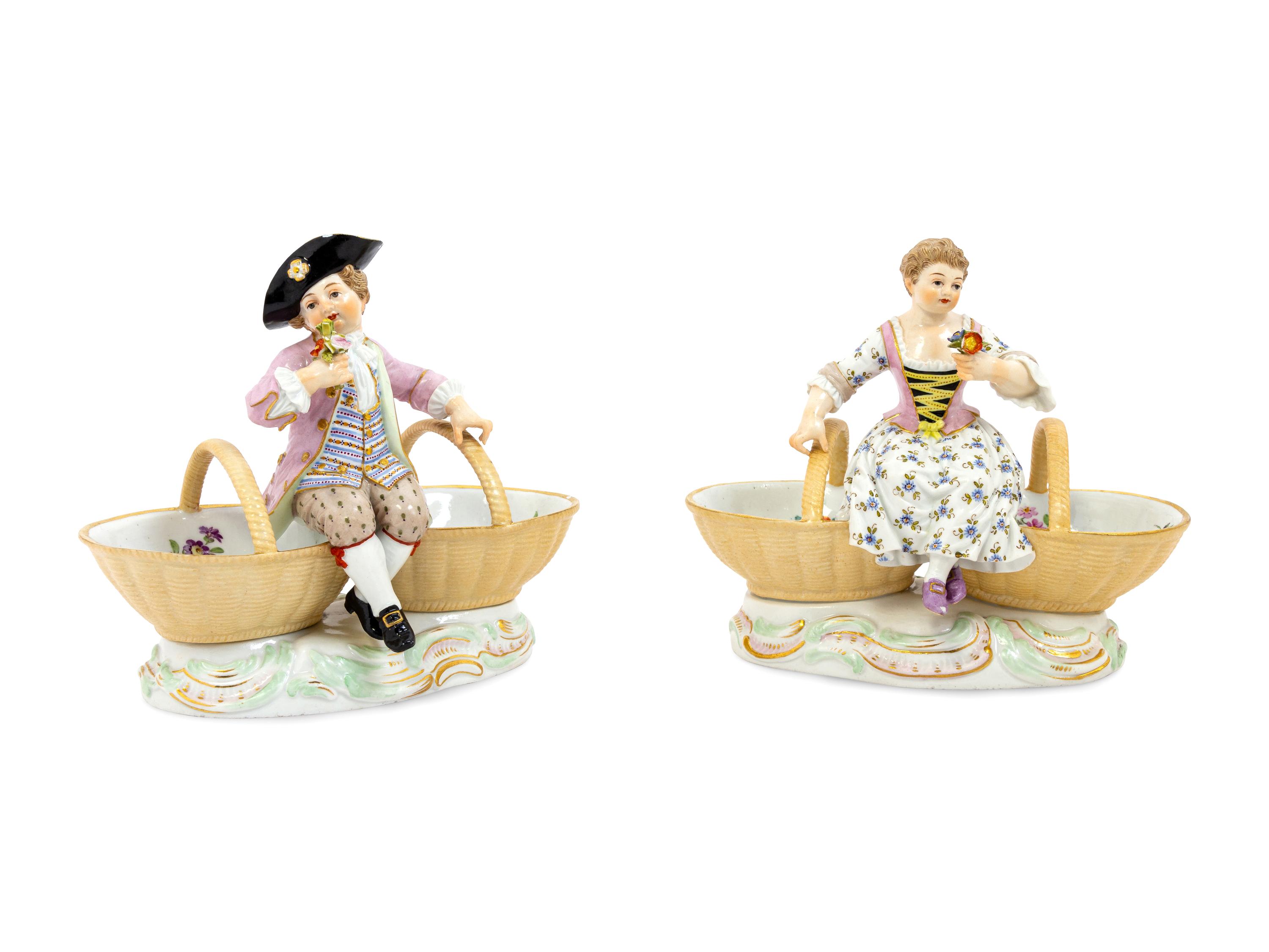 A Pair of Meissen Porcelain Basket Figures