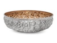 A Group of Three S. Kirk and Son Repousse Silver Dishes