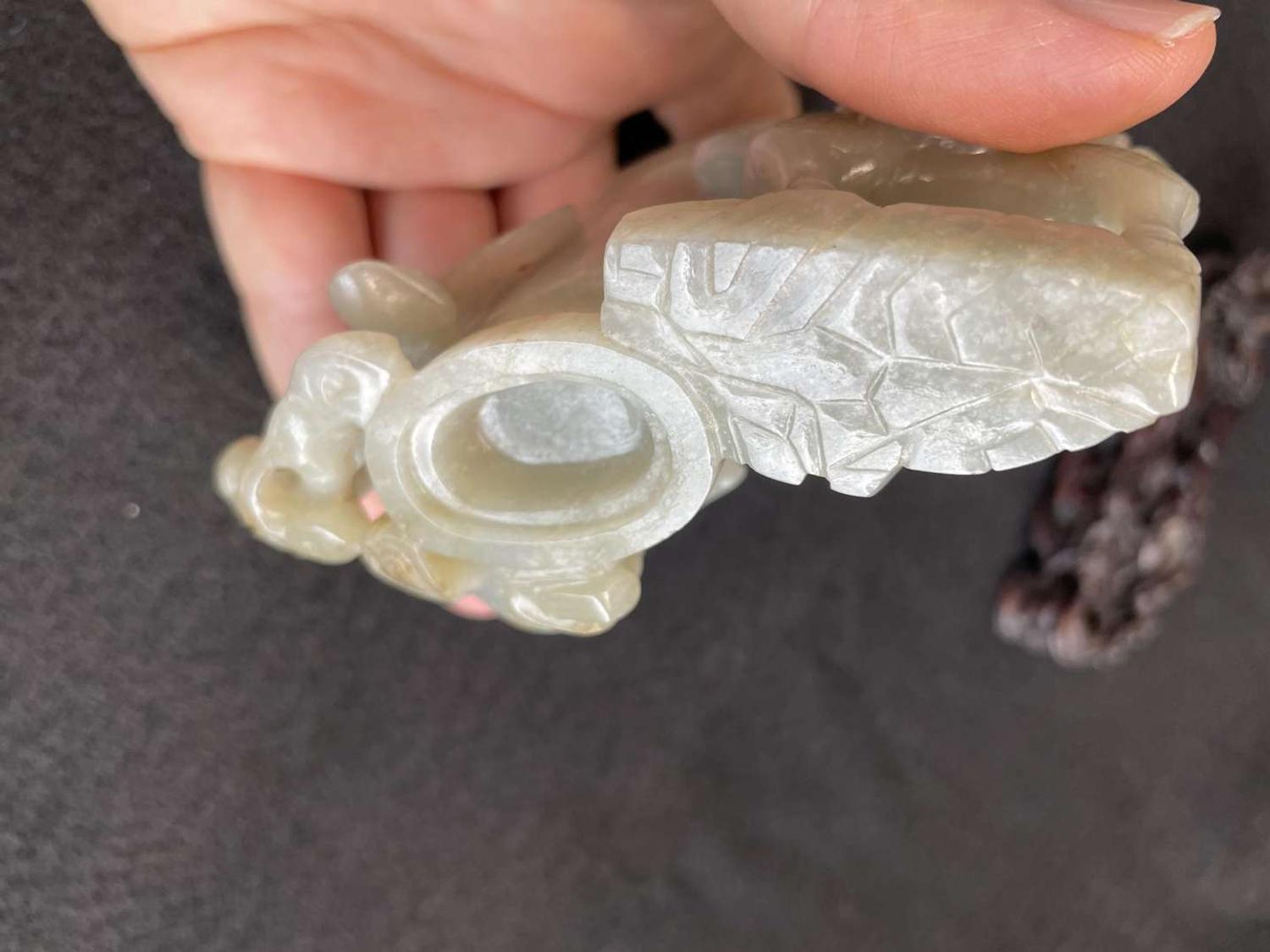 A Chinese jade "Boys, Kylin and Phoenix" vase on carved wood stand 玉雕童子凤鸟花樽及底座