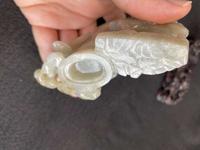 A Chinese jade "Boys, Kylin and Phoenix" vase on carved wood stand 玉雕童子凤鸟花樽及底座