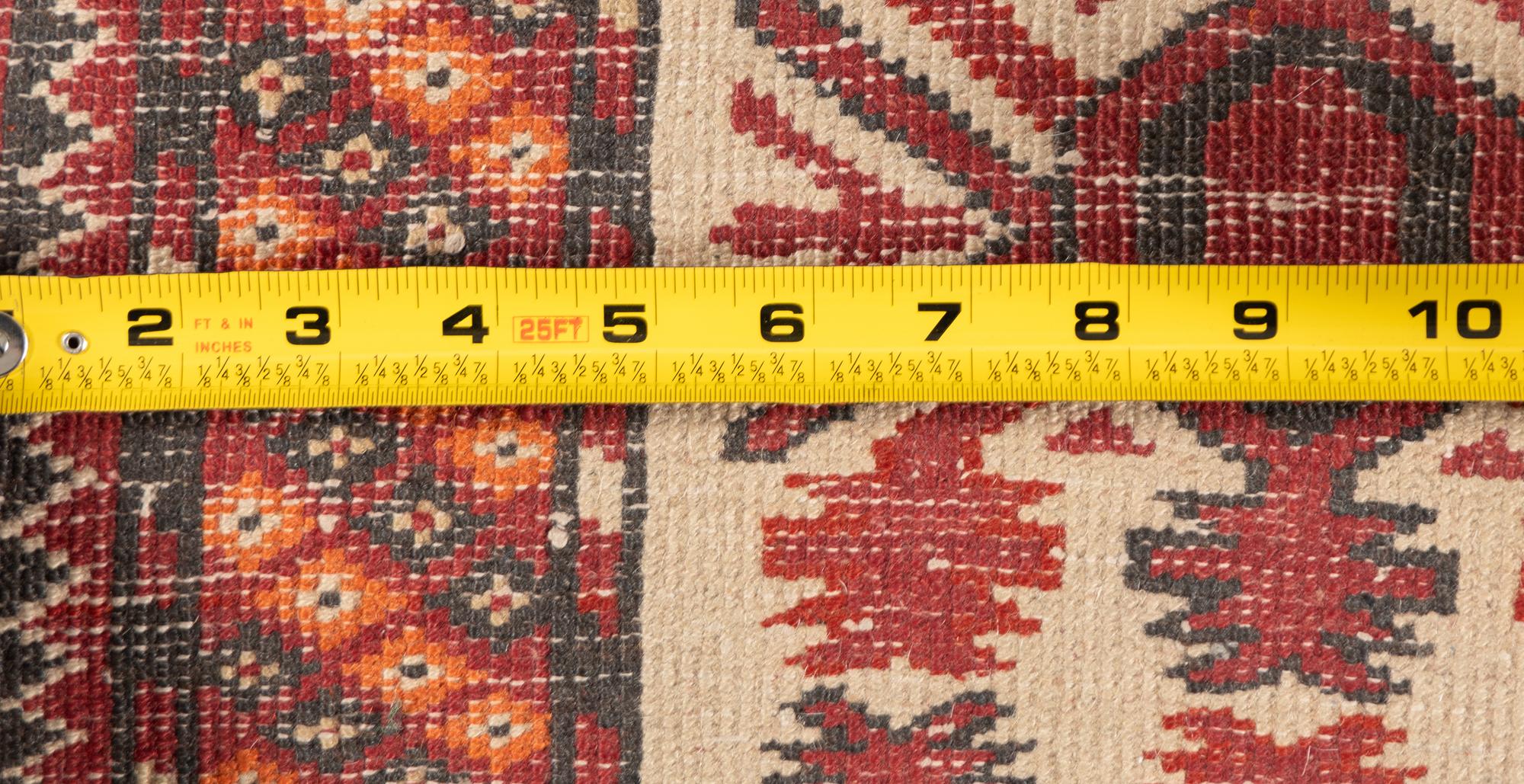 Two Caucasian Style Rugs