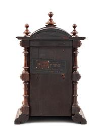 A Victorian Walnut Mantel Clock