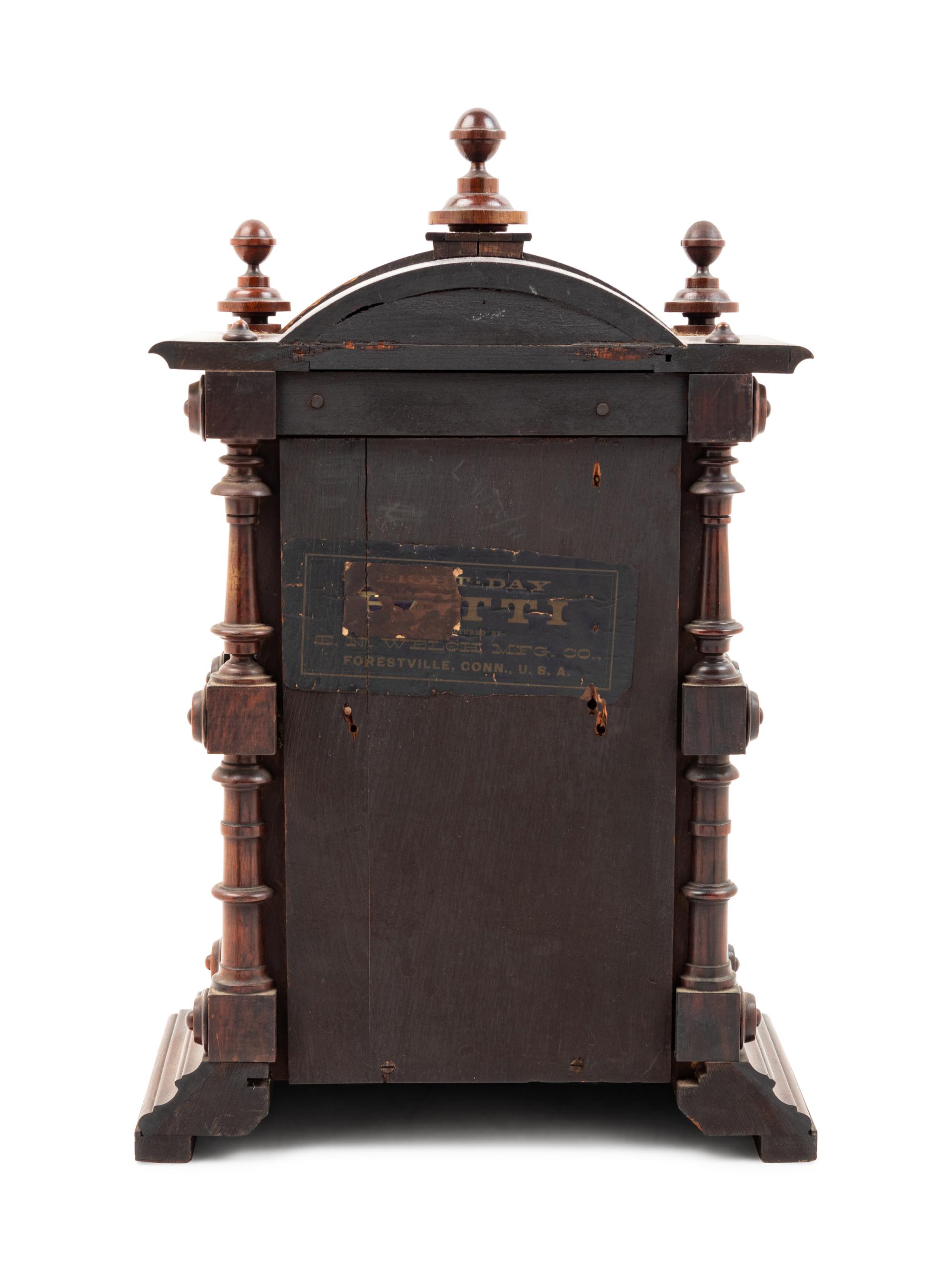 A Victorian Walnut Mantel Clock