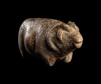 A Near Eastern Marble Figure of a Pregnant Mouflon