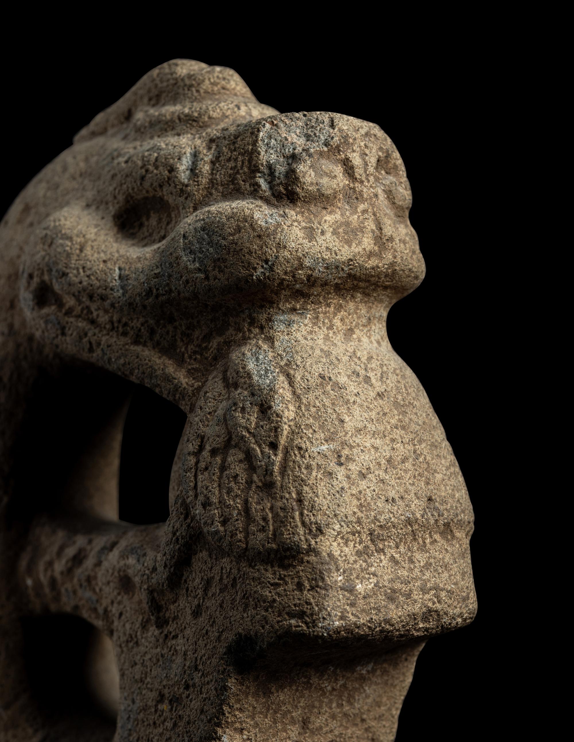 A Veracruz Stone Hacha in the Form of a Serpent Eating a Bird