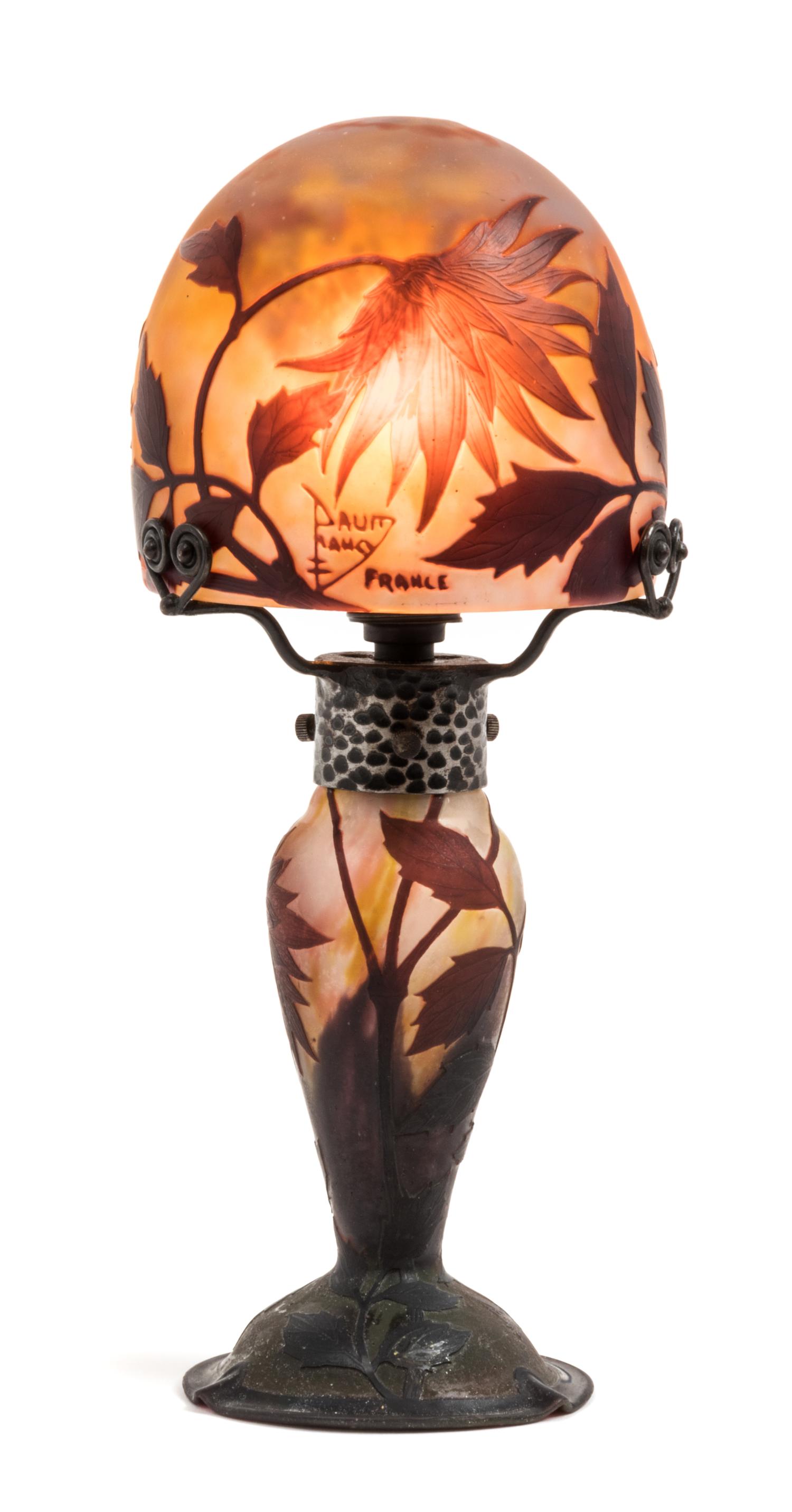 Daum, EARLY 20TH CENTURY, a cameo glass boudoir lamp, the domed shade and baluster form base with flower and leaf decoration