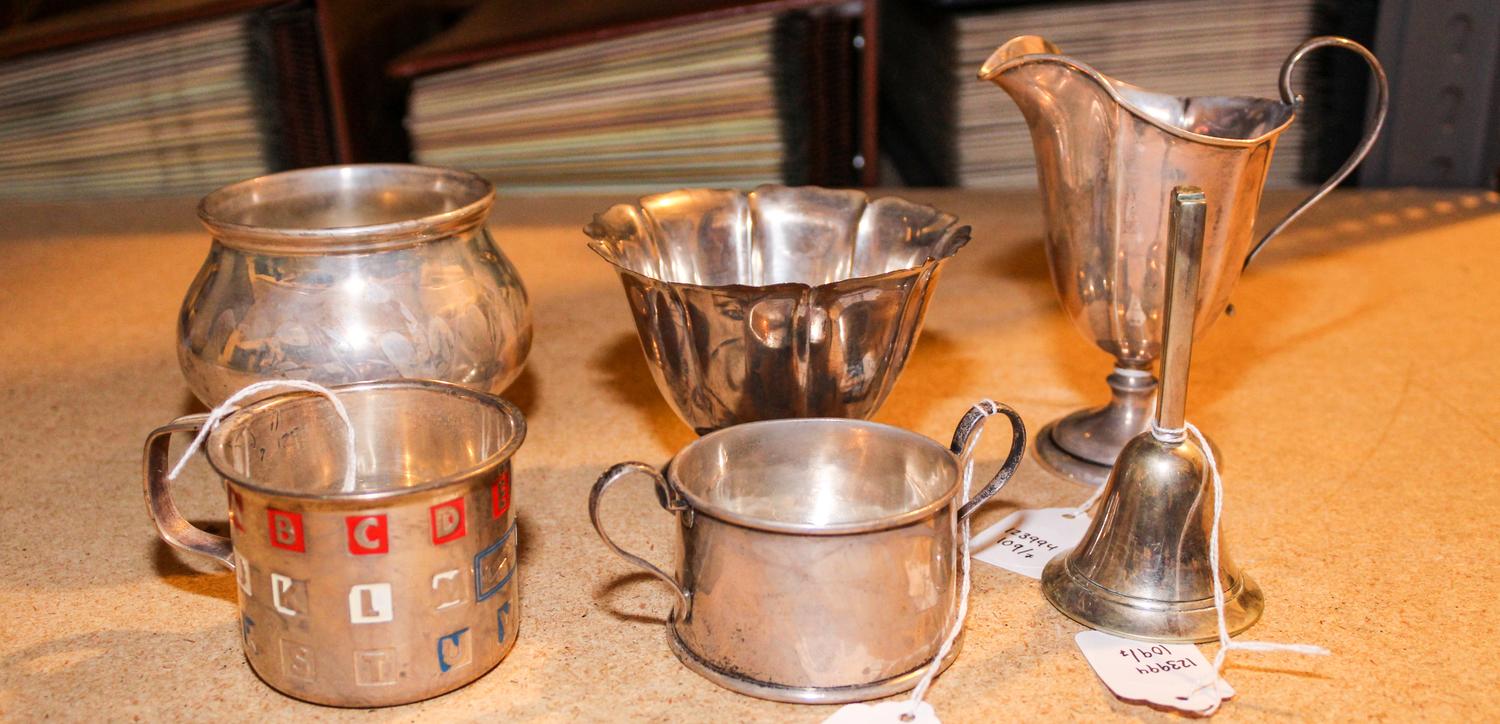 A Collection of American Silver Table Articles, Various Makers, comprising two bowls, two child's cups, a creamer, bell and a candlesti