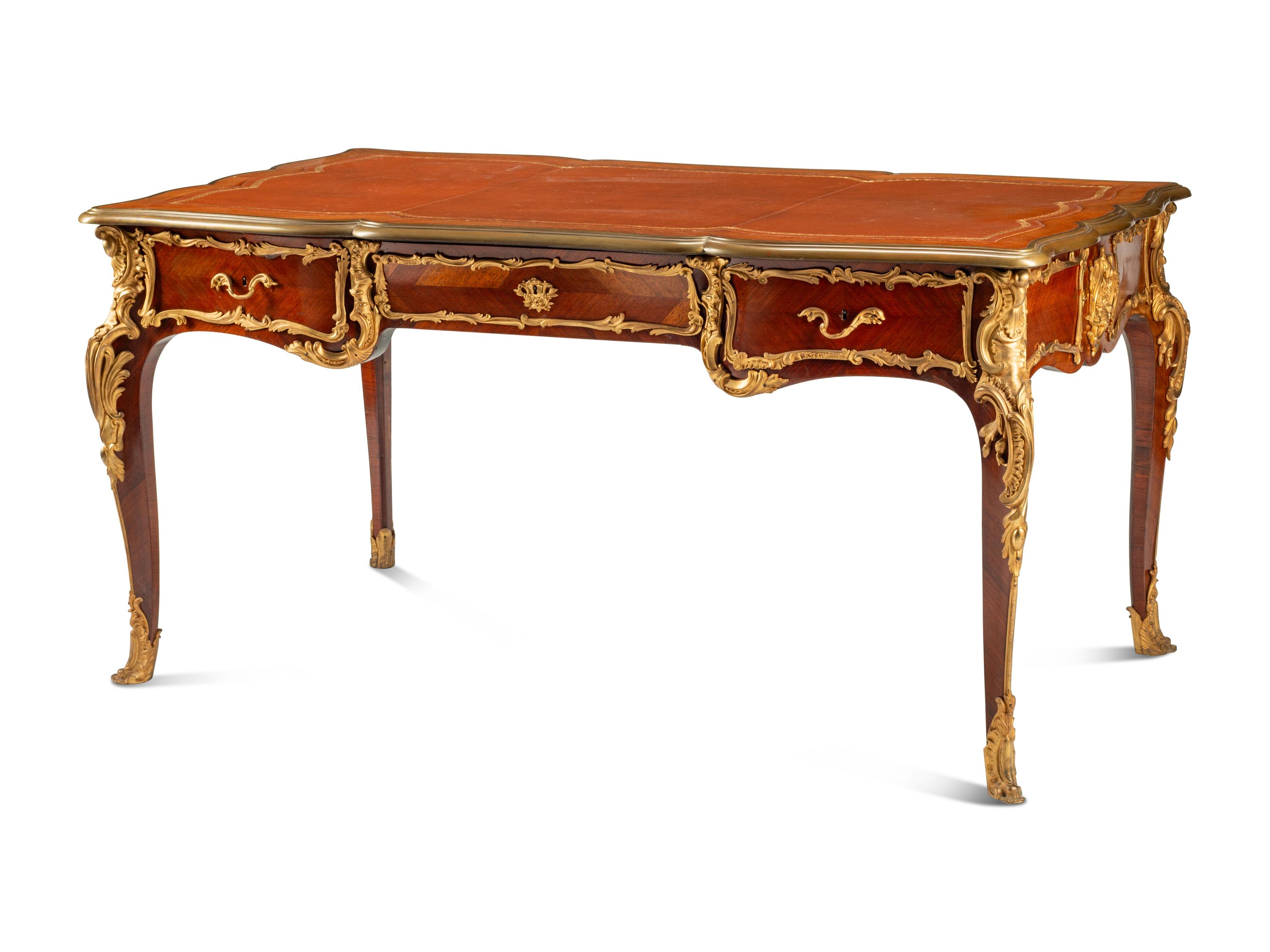 A Louis XV Style Gilt Bronze Mounted Kingwood Bureau Plat
