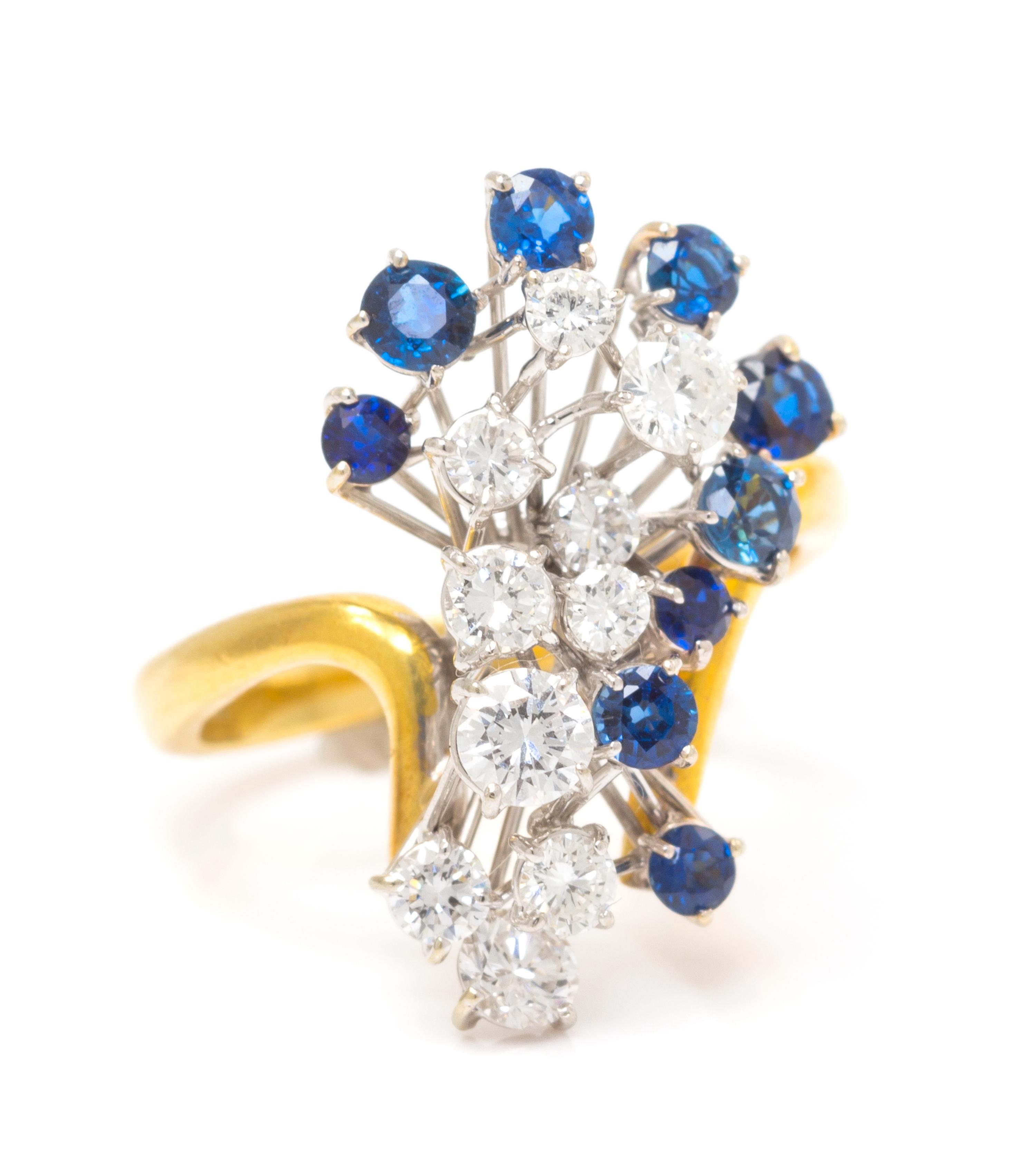An 18 Karat Bicolor Gold, Diamond and Sapphire Cocktail Ring, 2.90 dwts.