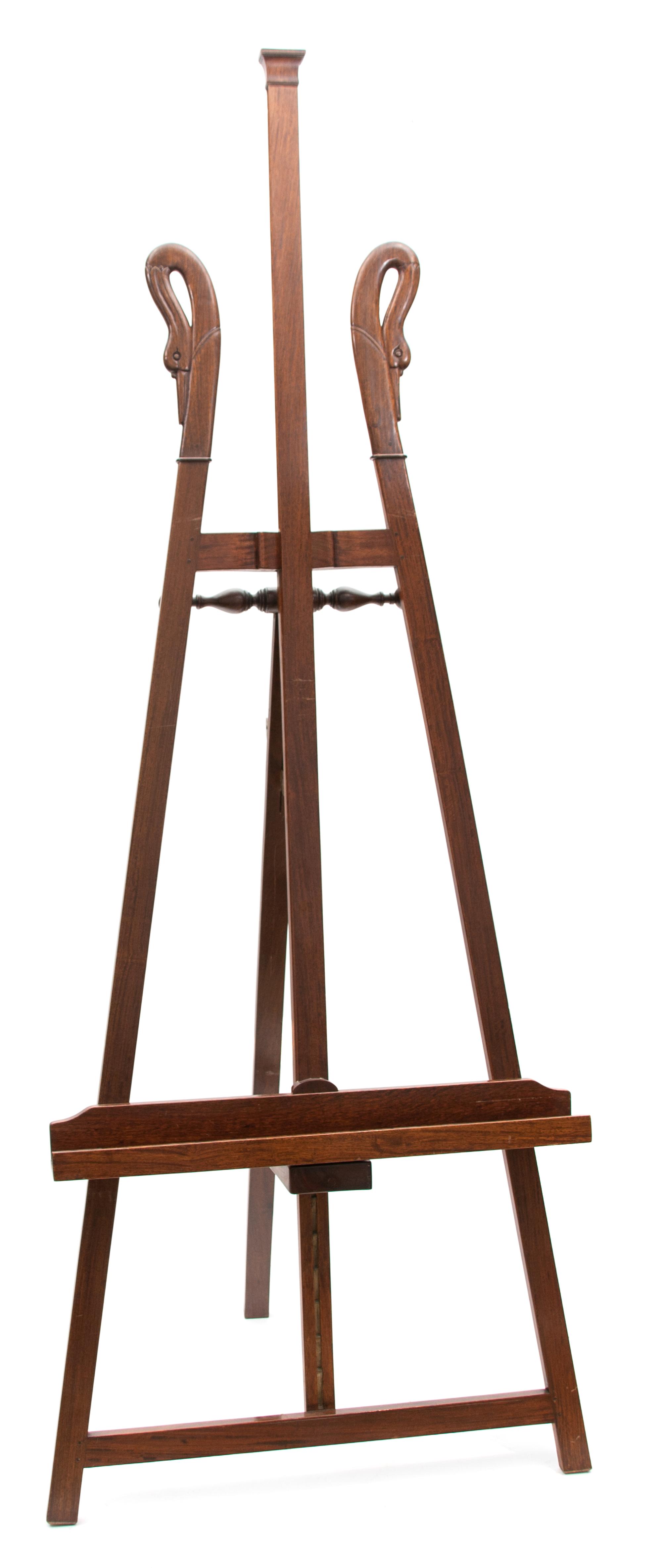 An English Carved Mahogany Swan's Neck Easel Height 81 x width 29 1/2 inches.