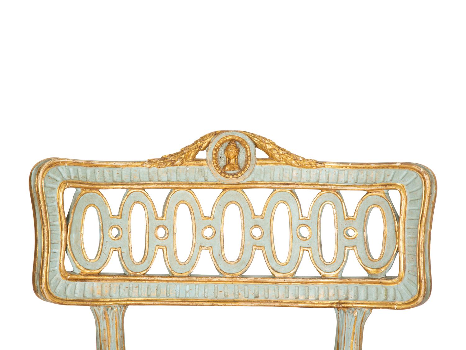 A Pair of Venetian Painted and Parcel Gilt Armchairs