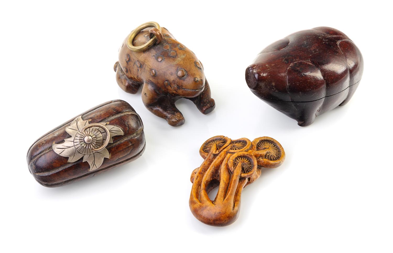 Four Chinese Hardwood Carvings Length of largest 2 1/2 inches.