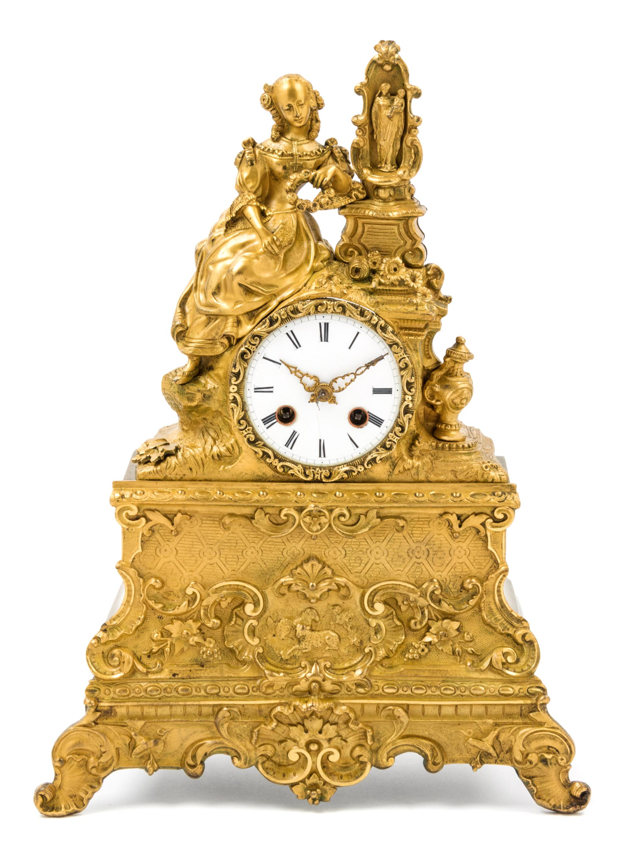 A French Gilt Metal Figural Mantel Clock Height 14 1/2 inches. — 19TH CENTURY