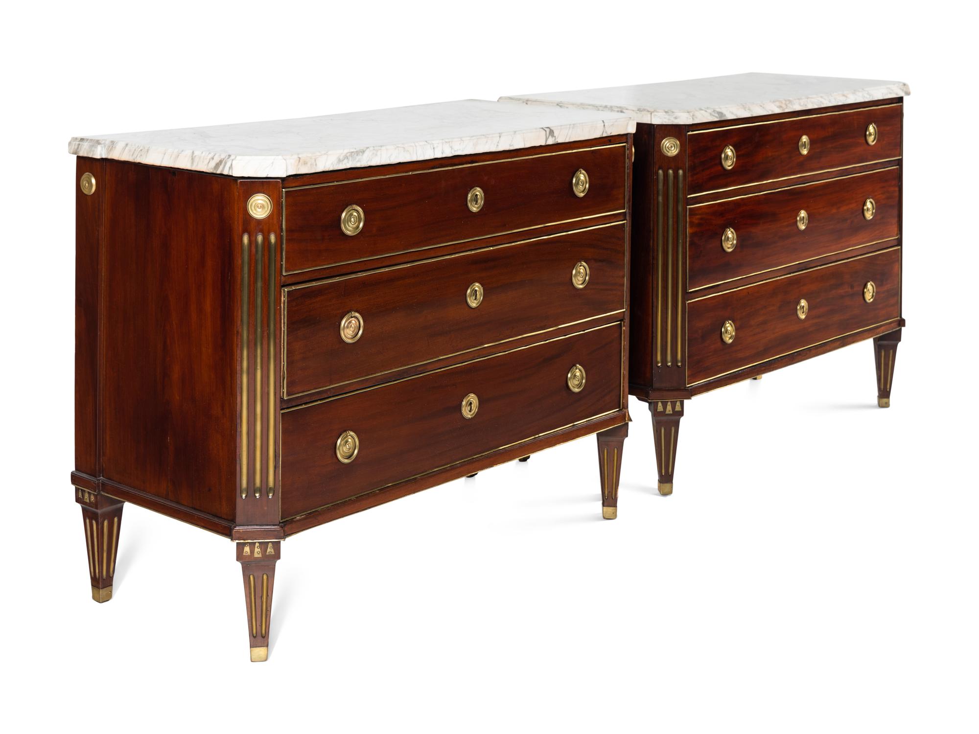 A Pair of Swedish Neoclassical Gilt Metal Mounted Mahogany Marble-Top Commodes