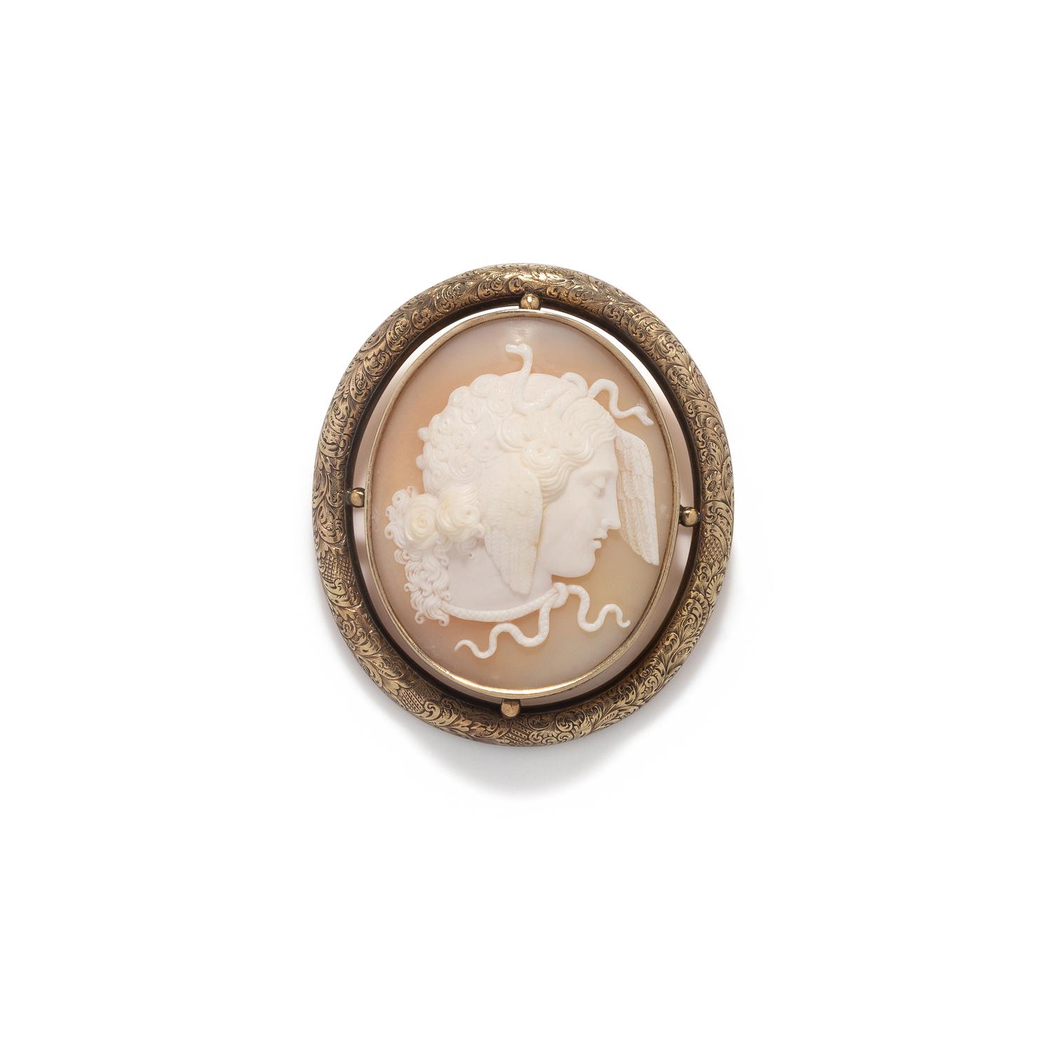 YELLOW GOLD AND SHELL MEDUSA CAMEO BROOCH