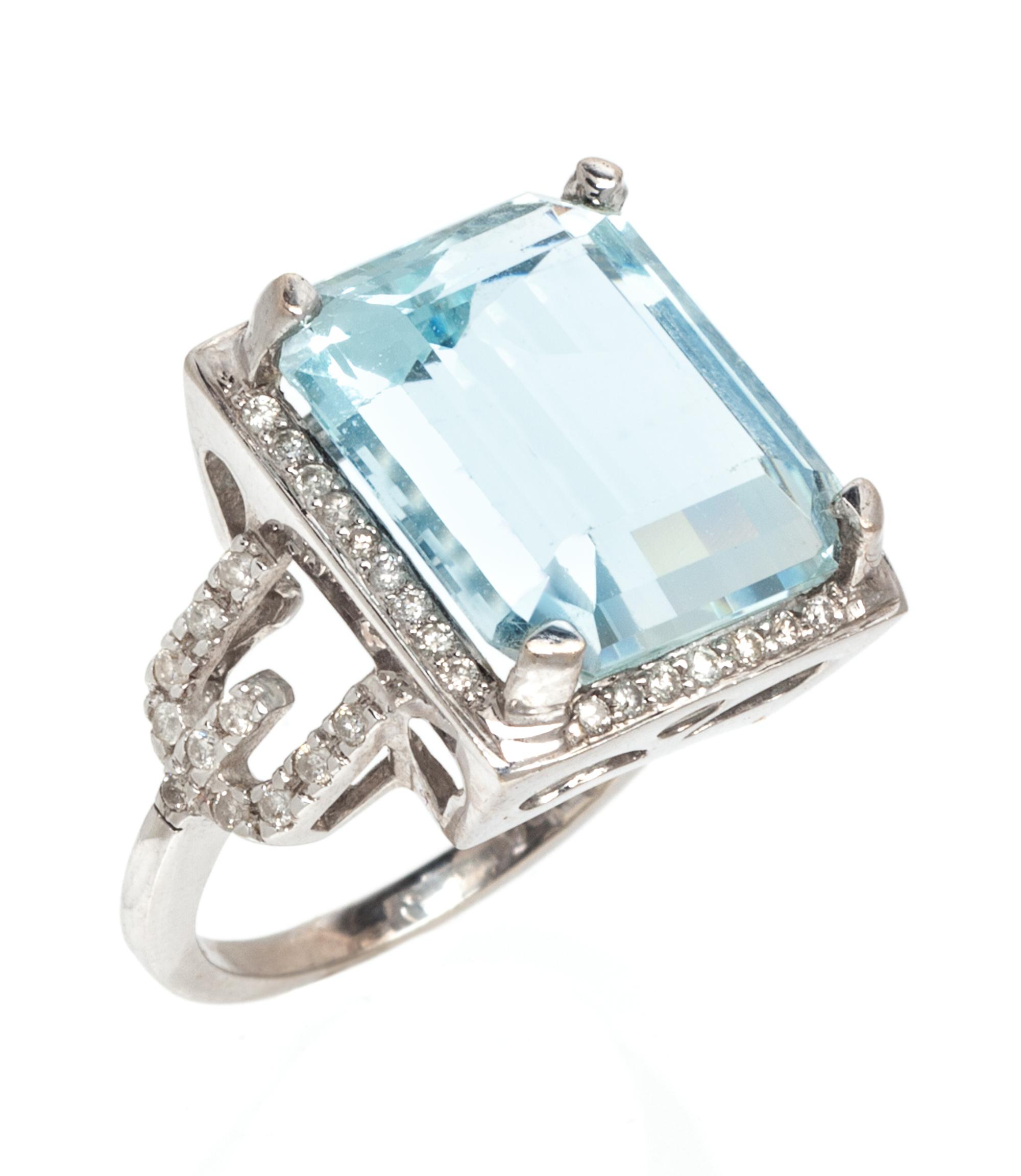 A 14 Karat White Gold, Aquamarine and Diamond Ring, 4.20 dwts.