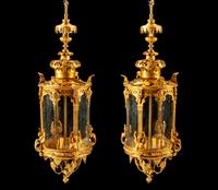 A Pair of Régence Style Gilt Bronze and Glass Lanterns
